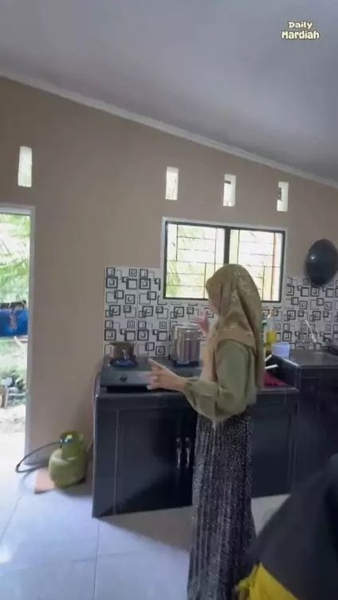 The kitchen is directly connected to the backyard of his house.