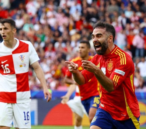 Tim Matador berhasil menyeruduk kemenangan dengan skor telak usai mencukur habis Kroasia 3-0.<br><br>Gol-gol dari Alvaro Morata, Fabian Ruiz, dan Dani Carvajal membawa Spanyol unggul di babak pertama. Foto: REUTERS / Fabrizio Bensch<br>