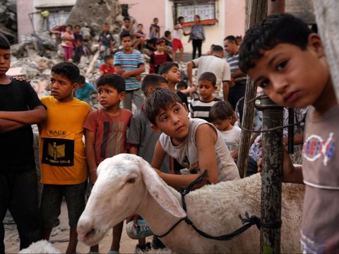 FOTO: Di Tengah Kekhawatiran Serangan Israel, Warga Palestina di Gaza Rayakan Iduladha dengan Berkurban Domba