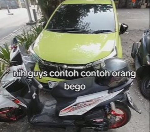 Halangi Bengkel, Mobil Ini Numpang Seakan Tak Punya Tempat Parkir Pribadi