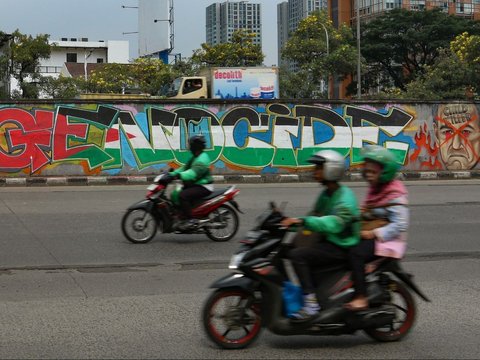 FOTO: Mural 'Stop Genocide' di Rafah Palestina dengan Wajah Benjamin Netanyahu Menghiasi Sudut Kota Jakarta