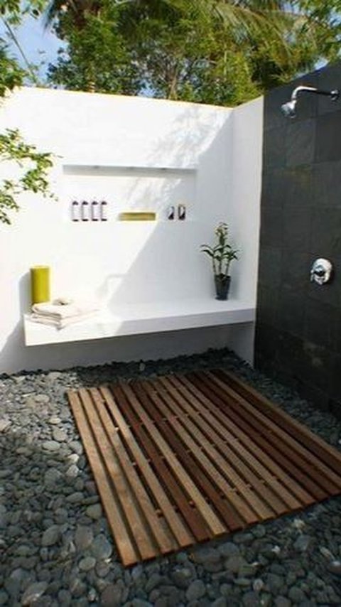 10. Design Mediterranean Bathroom with Natural Stone Floors