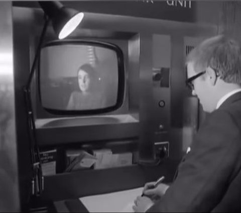 Appearance of ATMs in 1960, There Is a Person Behind the Machine Ready to Dispense Money