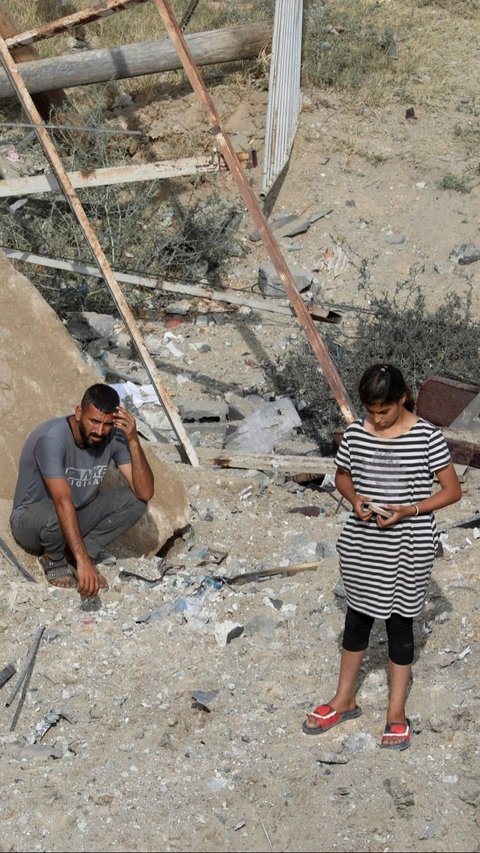 Dari data UNOSAT juga memperlihatkan 16.513 bangunan di Gaza rusak berat, 47.368 bangunan lannya rusak sedang dan 36.825 bangunan kemungkinan rusak. Foto: REUTERS / Ramadan Abed<br>