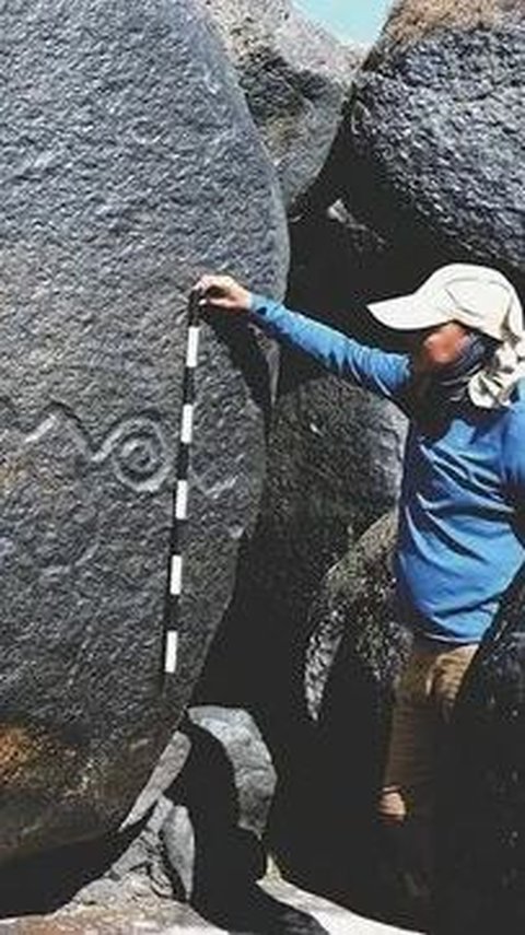 Ukiran di batu cadas berusia 2.000 tahun.