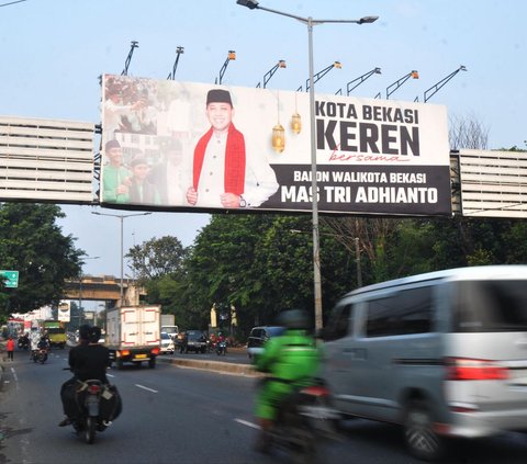 FOTO: Penampakan Alat Peraga Kampanye Pilkada Mulai Bertebaran di Bekasi