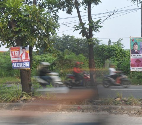 FOTO: Penampakan Alat Peraga Kampanye Pilkada Mulai Bertebaran di Bekasi