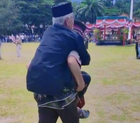 Viral Polisi Gendong Ayah yang Sakit di Momen Pelantikannya, Aksinya Tuai Pujian