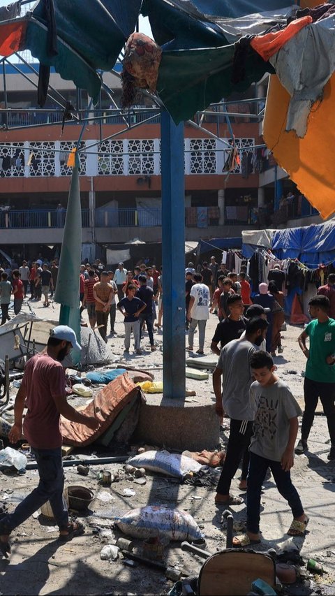 Selain itu, lebih dari 80 orang terluka dalam serangan pada Minggu (14/7) ini. Foto: AFP/Eyad Baba