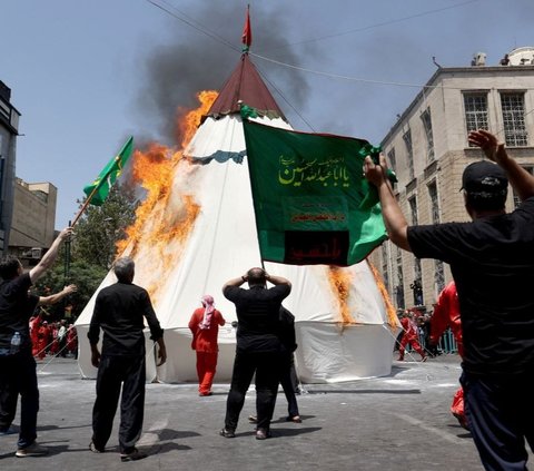 Menurut laporan dari Anadolu Agency, mayoritas warga Syiah di Iran memperingati Asyura dengan serangkaian acara yang berlangsung selama sepuluh hari di bulan Muharram. Foto: Reuters<br>