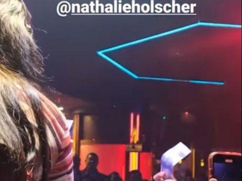 Nathalie Holscher Lying on a Pile of Money, Irish Bella's Comment Highlighted