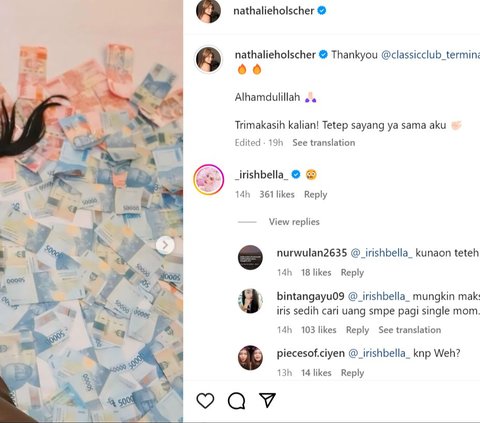 Nathalie Holscher Lying on a Pile of Money, Irish Bella's Comment Highlighted