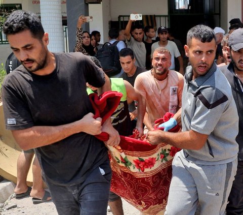 FOTO: Lagi, Israel Gempur Sekolah yang Jadi Kamp Pengungsian di Jalur Gaza hingga Tewaskan 30 Orang