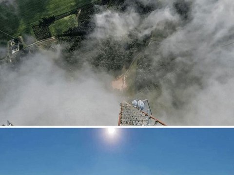 Gambar pekerja di puncak Menara Radio yang tingginya 600 meter. Menatap ke bawah sungguh menakutkan, tetapi pemandangan dari atas benar-benar menakjubkan.