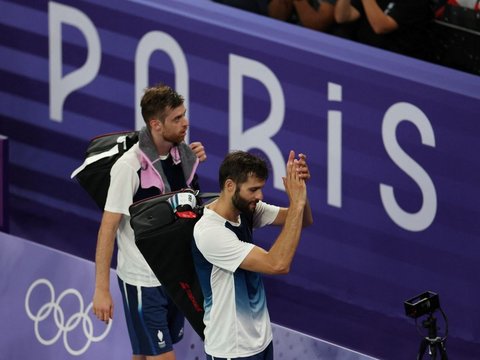 FOTO: Aksi Fajar Alfian/Muhammad Rian Ardianto Hajar Pasangan Prancis dan Lolos ke Perempatfinal Olimpiade 2024