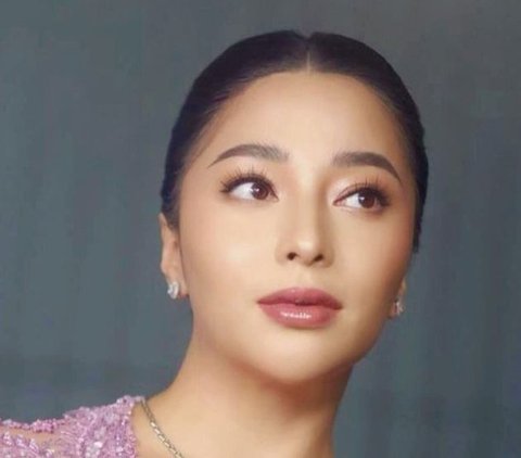 Portrait of Nikita Willy as a Bridesmaid, Striking a Flexible Pose Despite Being Pregnant