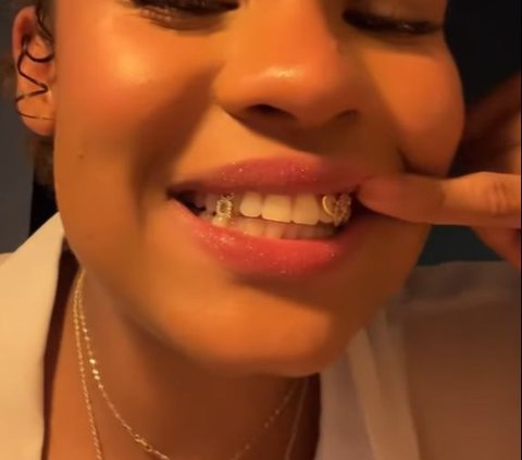 Basketball Player Nyara Sabally Showcases 14K Gold Olympic-Themed Grillz