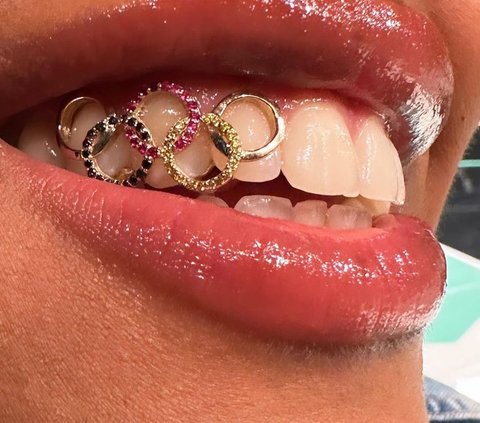 Basketball Player Nyara Sabally Showcases 14K Gold Olympic-Themed Grillz