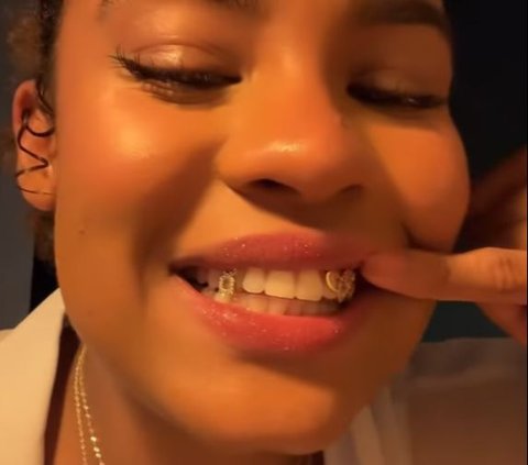 Basketball Player Nyara Sabally Showcases 14K Gold Olympic-Themed Grillz