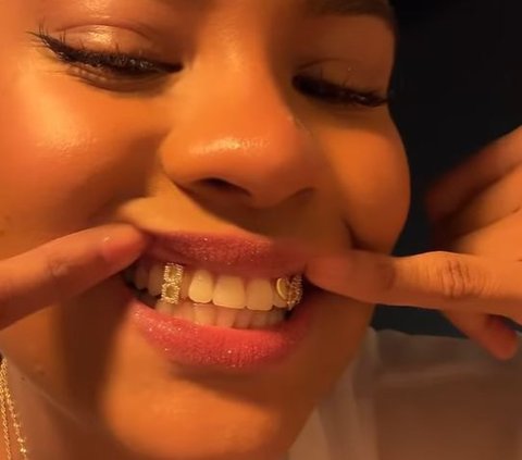 Basketball Player Nyara Sabally Showcases 14K Gold Olympic-Themed Grillz