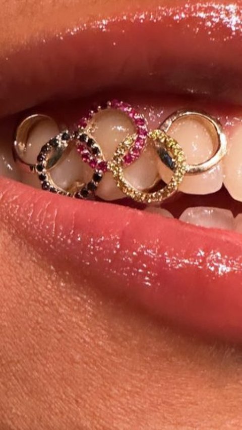 Basketball Player Nyara Sabally Showcases 14K Gold Olympic-Themed Grillz