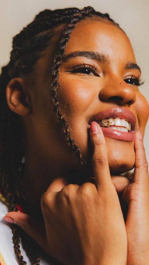 Basketball Player Nyara Sabally Showcases 14K Gold Olympic-Themed Grillz