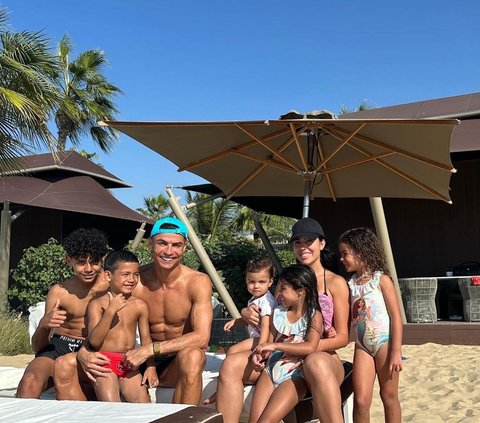 Portrait of Cristiano Ronaldo Taking Care of His Child, Often Spending Quality Time at the Beach