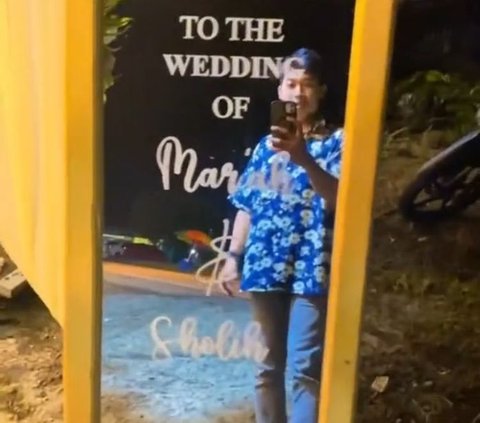 Pria Ini ‘Mampir’ ke Nikahan Orang Tak Dikenal saat Perjalanan Pulang, Videonya Viral Direspons Pengantin Pria