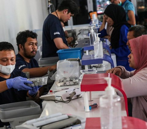 Festival yang diselenggarakan oleh Bank Indonesia (BI) ini bertujuan untuk meningkatkan literasi masyarakat tentang pentingnya rupiah dalam kehidupan sehari-hari, baik sebagai alat pembayaran yang sah maupun sebagai simbol kedaulatan negara. Foto: Liputan6.com / Angga Yuniar