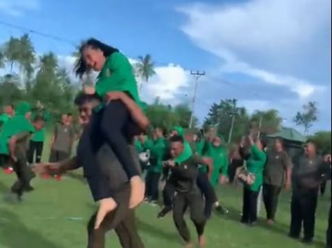 Not Carried, Husband's Action of Carrying Wife During This Running Competition Makes Netizens Laugh