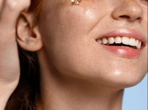 Ilustrasi mengeksfoliasi wajah