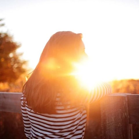 Woman and sunlight
