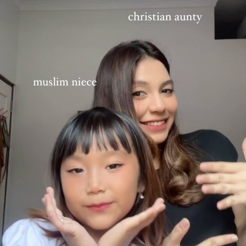 Beda Agama, Aksi Tante Asuh Keponakan Muslim Ini Curi Perhatian