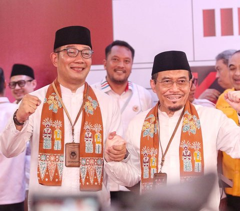 FOTO: Momen RK-Suswono Daftar Pilkada Jakarta, Semringah Didukung 15 Parpol hingga Angkat Salam The Jakmania