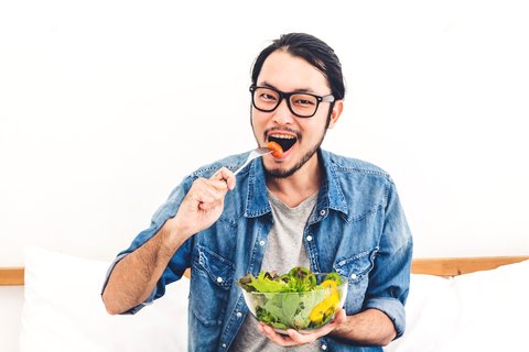 Ilustrasi pria makan.
