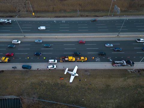 Tense Moments of an Airplane Crash on the Highway, Car Driver Panics as Debris Flies