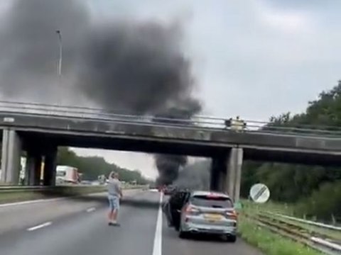 Tense Moments of an Airplane Crash on the Highway, Car Driver Panics as Debris Flies