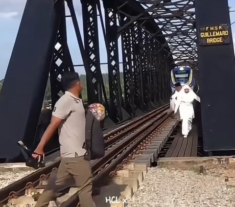 Prewedding Photo by the Train Tracks, Bride and Groom Nearly Hit by a Train, Netizens: 'Honeymoon Plans in the Next Realm'