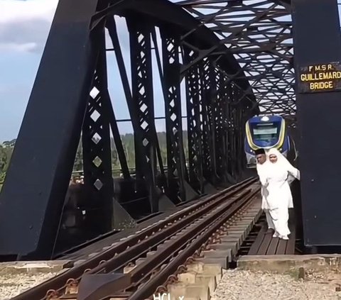 Prewedding Photo by the Train Tracks, Bride and Groom Nearly Hit by a Train, Netizens: 'Honeymoon Plans in the Next Realm'