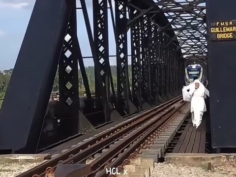 Prewedding Photo by the Train Tracks, Bride and Groom Nearly Hit by a Train, Netizens: 'Honeymoon Plans in the Next Realm'