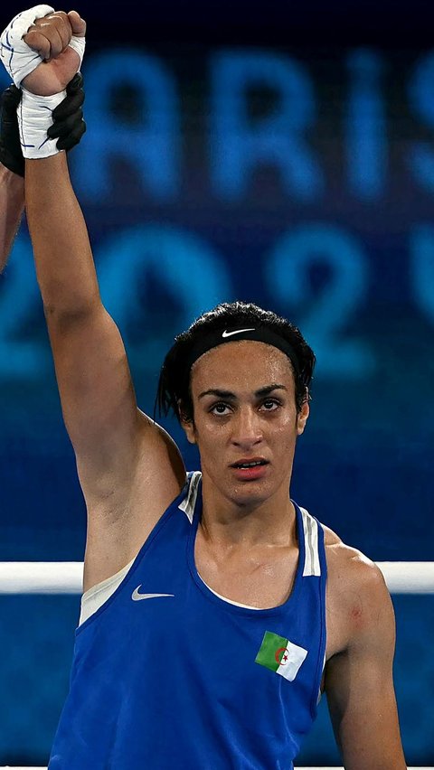 Imane Khelif menjadi yang pertama memastikan tempat di partai puncak tinju putri Olimpiade Paris 2024. Foto: AFP