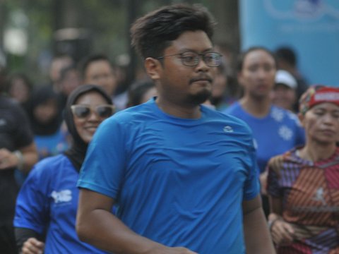 FOTO: Serunya Berlari Sambil Berwisata di TMII