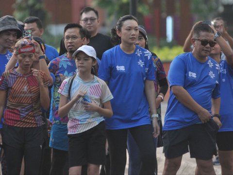 FOTO: Serunya Berlari Sambil Berwisata di TMII