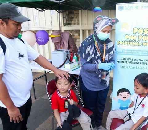 FOTO: Lindungi Anak dari Kelumpuhan Permanen, Program Imunisasi Polio Digelar Gratis Saat CFD Bundaran HI