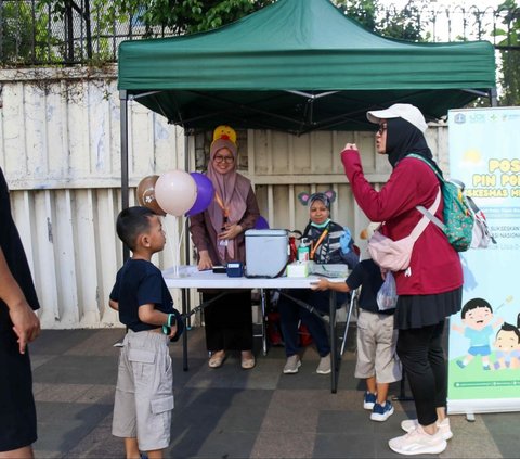 FOTO: Lindungi Anak dari Kelumpuhan Permanen, Program Imunisasi Polio Digelar Gratis Saat CFD Bundaran HI