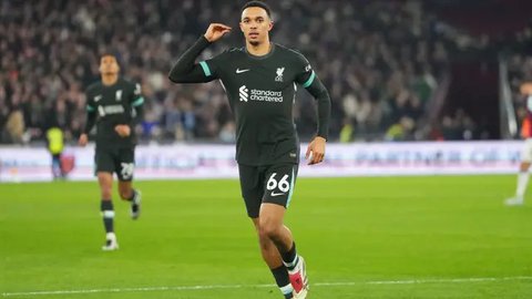 Pada paruh kedua, giliran Trent Alexander-Arnold dan Diogo Jota yang menjebol gawang West Ham. (AFP/Adrian Dennis)