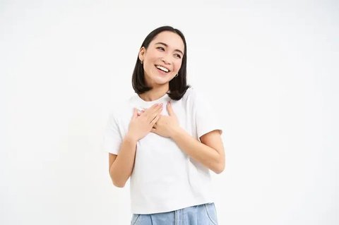 ilustrasi perempuan tersenyum/Dragon Images/Shutterstock