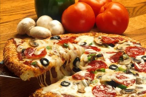 Ilustrasi Pizza. (Foto:AP/AFP)
