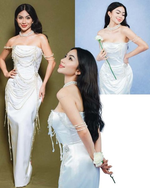 Dengan hiasan mutiara di berbagai bagian,&amp;nbsp;Ariel terlihat memukau kenakan dress mermaid putih yang indah. Tunjukkan lekuk tubuh jam pasir yang memesona.&amp;nbsp;