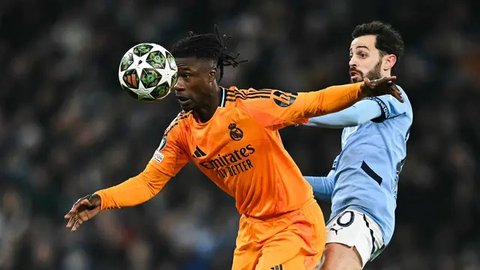 Laga berlangsung ketat dan sengit. The Citizens sempat unggul dua kali, namun Real Madrid berhasil membalikkan keadaan. (Paul ELLIS/AFP)